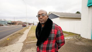 Brian Chaney stands near the area, Wednesday, Jan. 10, 2024, in Keego Harbor, Mich., where he was arrested. The officer told Chaney he thought Chaney was breaking into cars and cuffed him. Chaney, who is Black, asked for a supervisor. The white officer told pointed to another officer from a different police department and told Chaney he was the supervisor. The Keego Harbor chief said in a deposition in a lawsuit Chaney filed that it's ok for his officers to lie when they are not under oath.