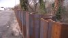 Crews install steel flood walls along Coyote Creek in San Jose