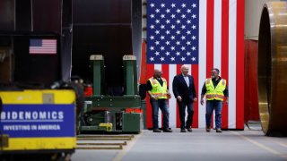 U.S. President Joe Biden speaks with workers while visiting CS Wind, the largest wind tower manufacturer in the world, in Pueblo, Colorado, U.S., November 29, 2023. 