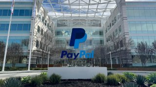 A PayPal sign is seen at its headquarters in San Jose, California, on Jan. 30, 2024.
