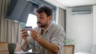 Nearly 1 in 4 Americans with debt are putting less money toward credit card payments: ‘People are really struggling’