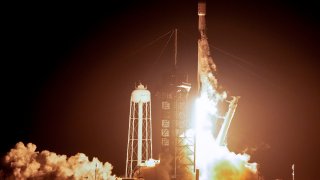 A SpaceX Falcon 9 rocket lifts off from pad 39A at Kennedy Space Center in Cape Canaveral, Fla.