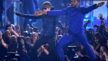 Singers Usher and Justin Bieber perform onstage during The 53rd Annual GRAMMY Awards held at Staples Center on February 13, 2011 in Los Angeles, California. (Photo by Michael Caulfield/WireImage)