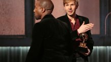 LOS ANGELES, CA - February 8, 2015 Kanye West avoids contact with an inviting Beck after Beck won Al