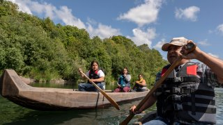 Yurok tribal members lead a redwood canoe tour