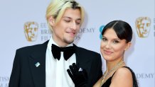 Jake Bongiovi and Millie Bobby Brown attend the EE British Academy Film Awards 2022
