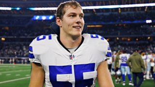 ARLINGTON, TEXAS – DECEMBER 4:  Leighton Vander Esch #55 of the Dallas Cowboys walks off the field after a game against the Indianapolis Colts at AT&T Stadium on December 4, 2022 in Arlington, Texas. The Cowboys defeated the Colts 54-19.