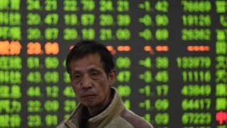 A customer is paying attention to the Chinese stock market at a stock exchange in Hangzhou, China, on January 22, 2024. (Photo by Costfoto/NurPhoto via Getty Images)