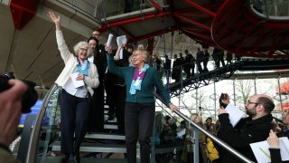 Members of Swiss association Senior Women for Climate Protection react after the announcement of decisions after a hearing of the European Court of Human Rights (ECHR) to decide in three separate cases if states are doing enough in the face of global warming in rulings that could force them to do more, in Strasbourg, eastern France, on April 9, 2024.