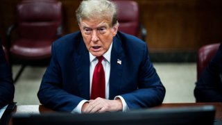 Former President Donald Trump arrives at Manhattan criminal court with his legal team ahead of the start of jury selection in New York, NY on Monday, April 15, 2024. 