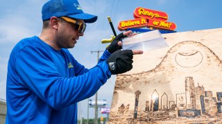 Michael Papadakis, also known as @Sunscribes, captured the 2024 total solar eclipse in his signature way — harnessing the power of the sun to create an unbelievable piece of art for the Ripley’s Believe It or Not! exhibit collection. Image take on Monday, April 8, 2024 in Dallas. (Sam Hodde/AP Images for Ripley Entertainment Inc.)