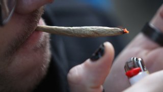 A recreational marijuana smoker indulges in smoking weed on April 14, 2020 in the Bushwick section of the Brooklyn borough of New York City.