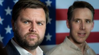 (L-R) J.D. Vance, a Republican candidate for U.S. Senate in Ohio, and Sen. Josh Hawley (R-MO) speak with reporters at a campaign rally on May 1, 2022 in Cuyahoga Falls, Ohio.