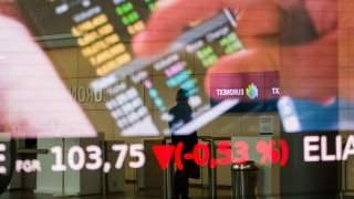Stock price information reflected on a window at the Euronext NV stock exchange in Paris, France, on Monday, March 13, 2023.