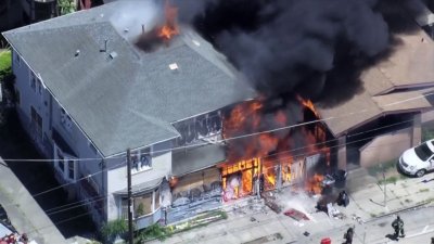 Watch: Firefighters battle structure fire in Oakland