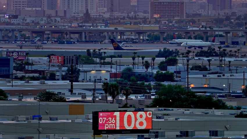 FILE – The unofficial temperature hits 108 degrees at dusk at Sky Harbor International Airport in Phoenix on July 12, 2023. Phoenix saw 20 consecutive days of extreme heat stress in July, the longest run of such dangerously hot days in the city since at least 1940, according to the data from the Copernicus Climate Change Service. The death certificates of more than 2,300 people who died in the United States last summer mention the effects of excessive heat, the highest number in 45 years of records, according to an Associated Press analysis of Centers for Disease Control and Prevention data. With May already breaking heat records, 2024 could be even deadlier.