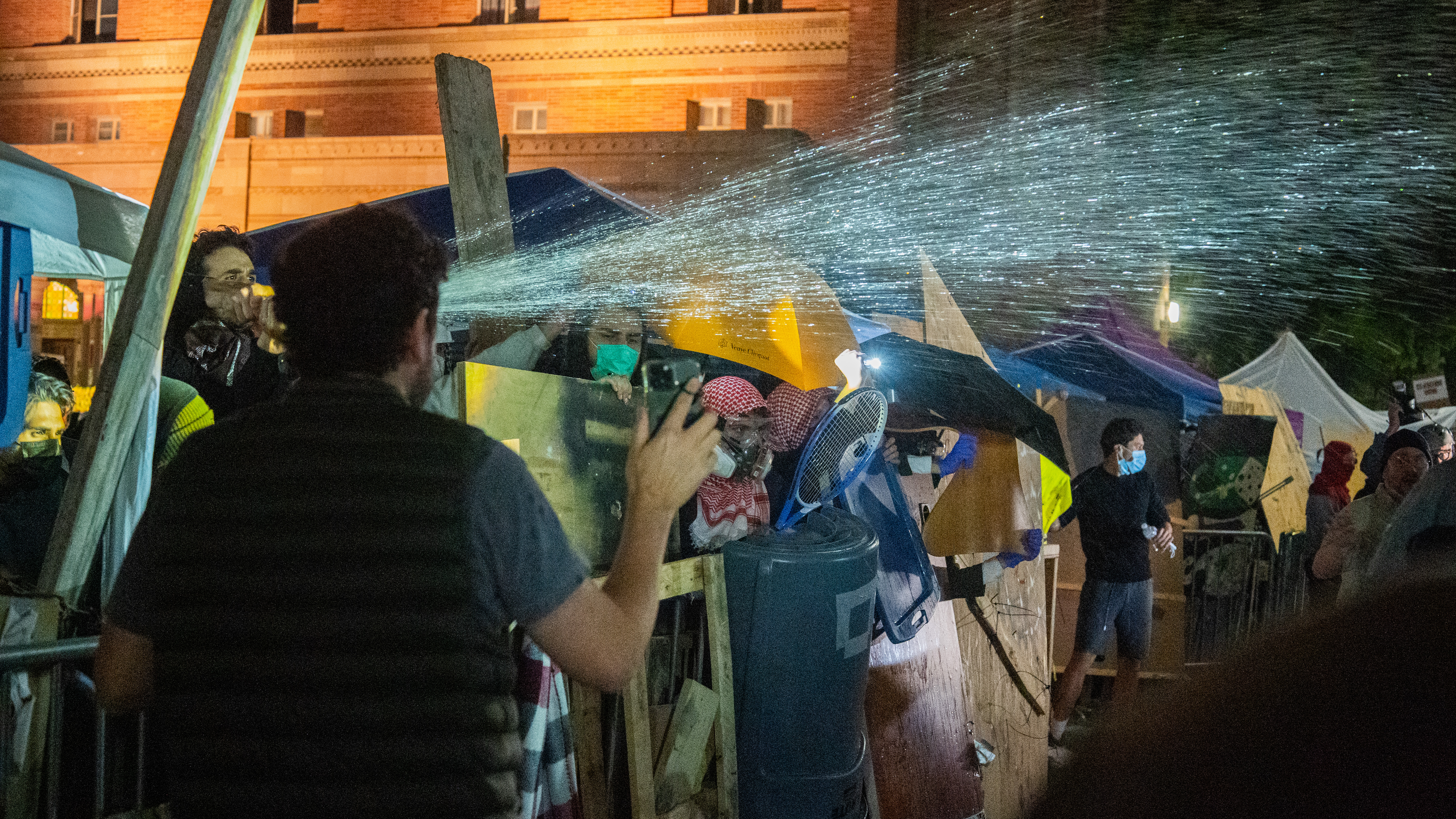 Israeli Protesters Laid Siege On The UCLA Gaza Support Camp For Over 4 Hours. The Israeli Protesters Used Make Shift Weapons, Chemical Weapons And Fireworks To Assault The Camp All Night Long, in Los Angeles, on May 1, 2024.(Photo by Shay Horse/NurPhoto via Getty Images)