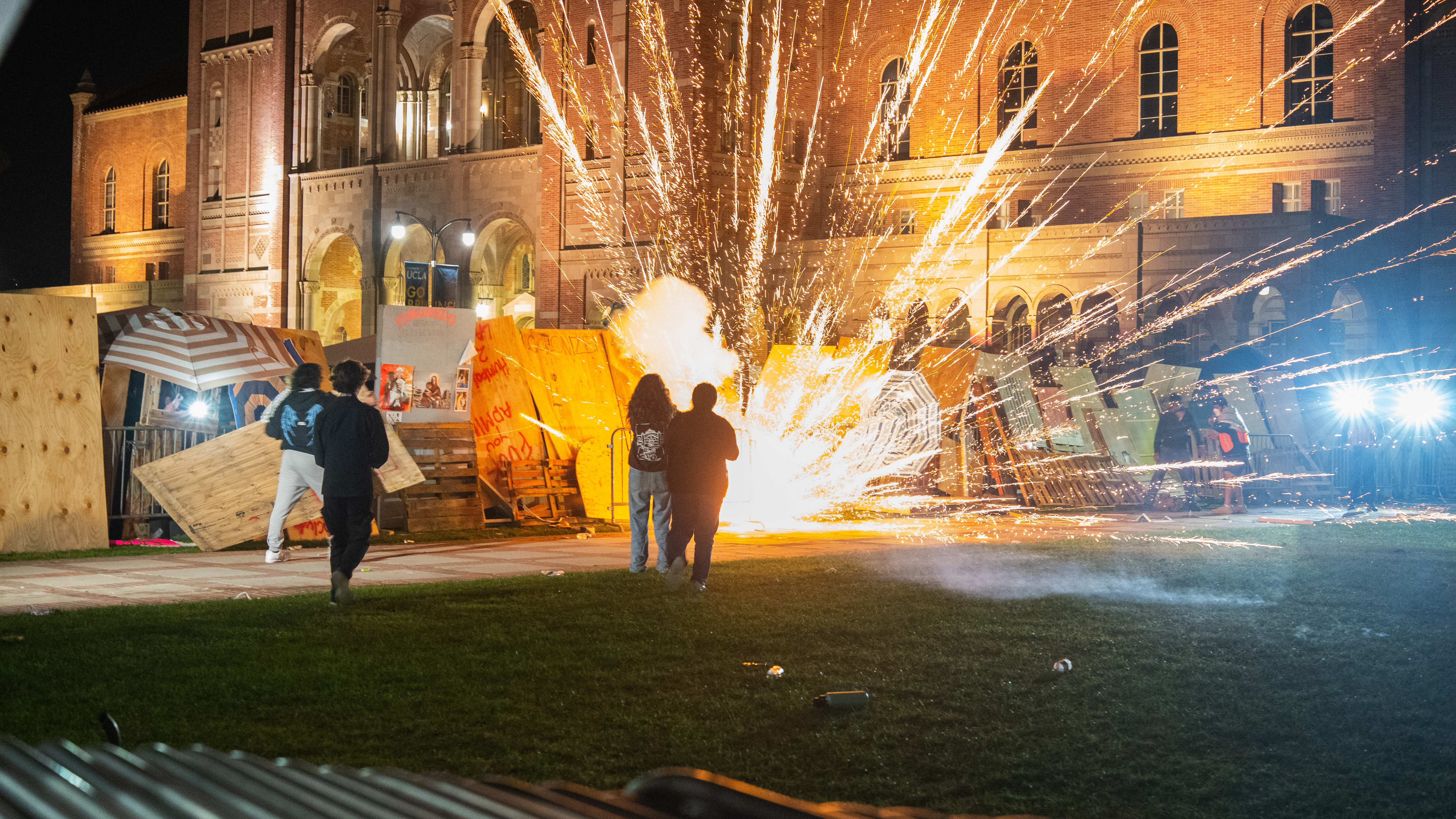 Israeli Protesters Laid Siege On The UCLA Gaza Support Camp For Over 4 Hours. The Israeli Protesters Used Make Shift Weapons, Chemical Weapons And Fireworks To Assault The Camp All Night Long, in Los Angeles, on May 1, 2024.(Photo by Shay Horse/NurPhoto via Getty Images)