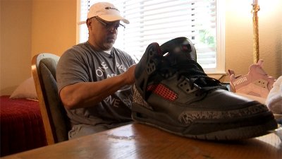 East Bay man takes donations of old, worn shoes, makes them look new, gives them away