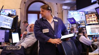 Traders work on the floor of the New York Stock Exchange during afternoon trading on June 03, 2024 in New York City. 