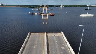 In an aerial view, the remains of the Francis Scott Key Bridge are seen as salvage crews continue to work to clean up the wreckage after the bridge collapsed in the Patapsco River on June 11, 2024 in Baltimore, Maryland. 