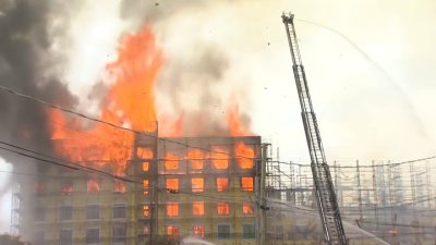 Watch: Flames rip through under-construction building in Redwood City