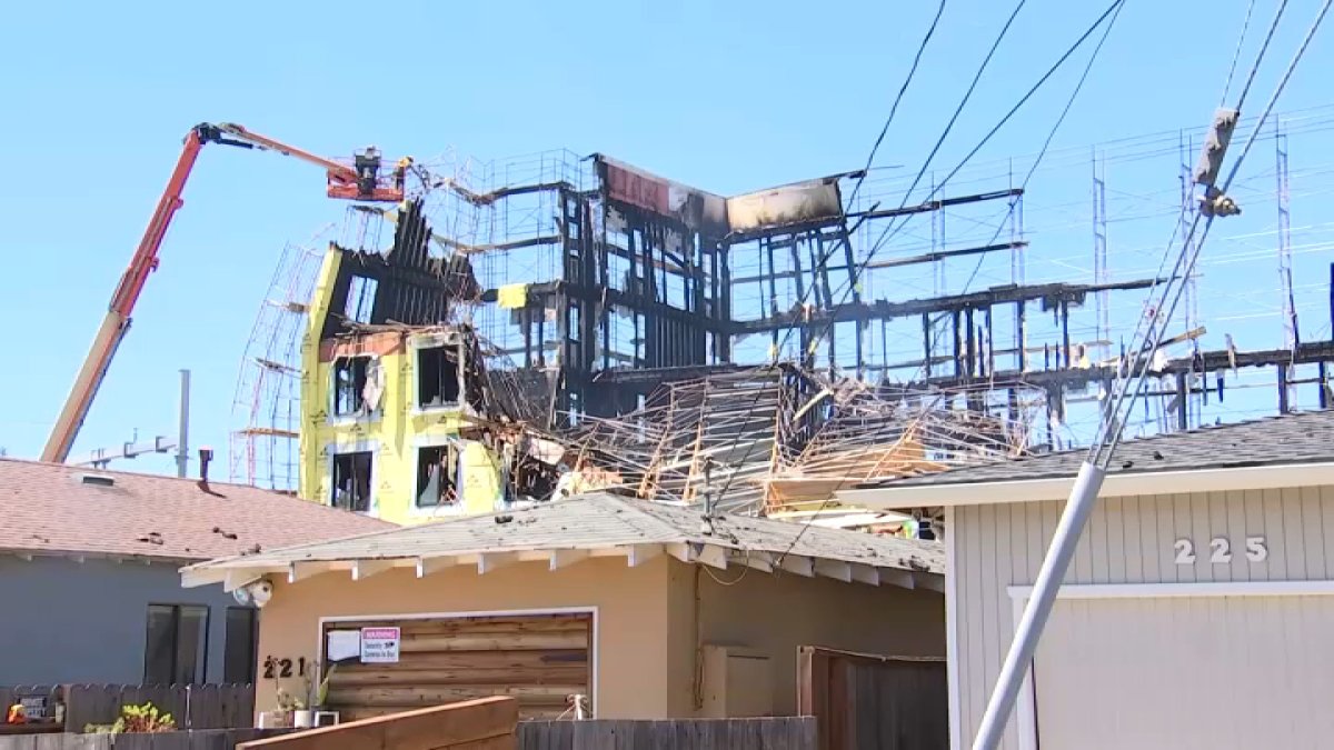 Cleanup continues after fire destroys Redwood City housing project ...