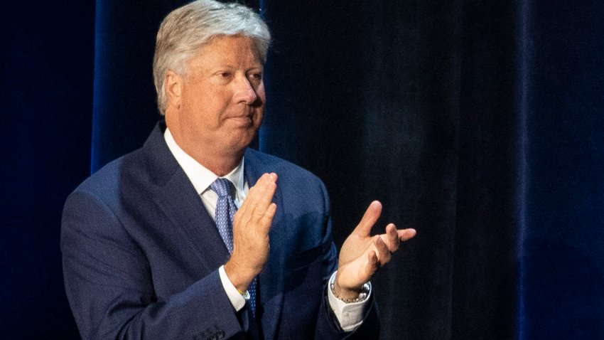 Pastor Robert Morris applauds