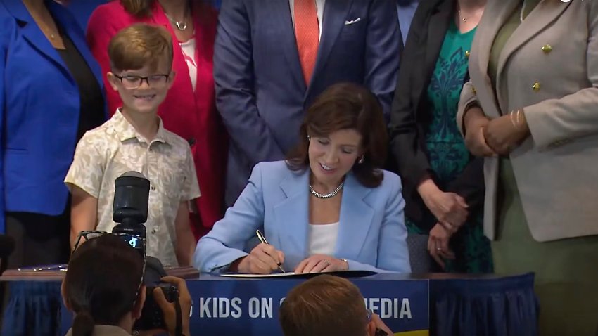 New York Governor, Gov. Kathy Hochul signs a bill that would allow parents to block their children from getting social media posts suggested by a platform’s algorithm, a move to limit feeds critics argue are addictive.