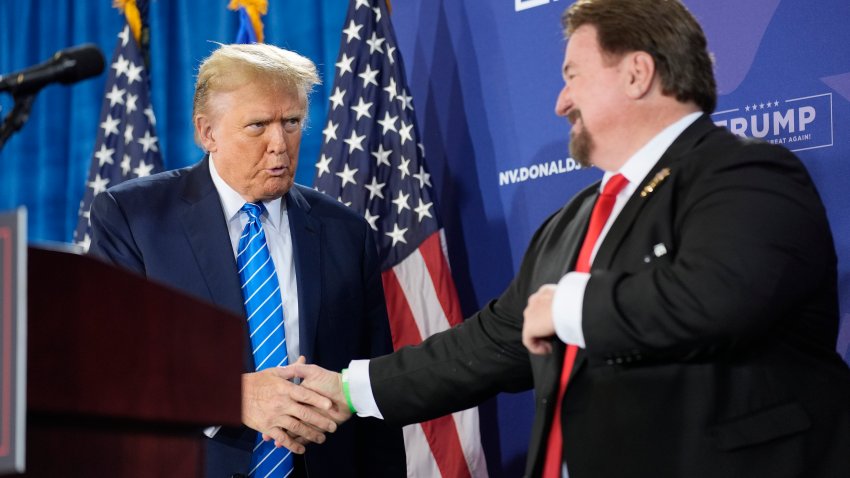 FILE – Nevada GOP chair Michael McDonald, right, shakes hands with Republican presidential candidate former President Donald Trump at a campaign event, Jan. 27, 2024, in Las Vegas.