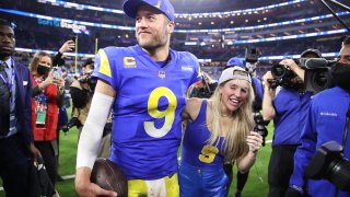 FILE - Matthew Stafford #9 of the Los Angeles Rams and wife Kelly Stafford