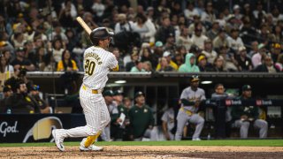 SAN DIEGO, CALIFORNIA – JUNE 11: Kyle Higashioka #20 of the San Diego Padres hits a walk-off home run in the ninth inning against the Oakland Athletics at Petco Park on June 11, 2024 in San Diego, California. (Photo by Matt Thomas/San Diego Padres/Getty Images)