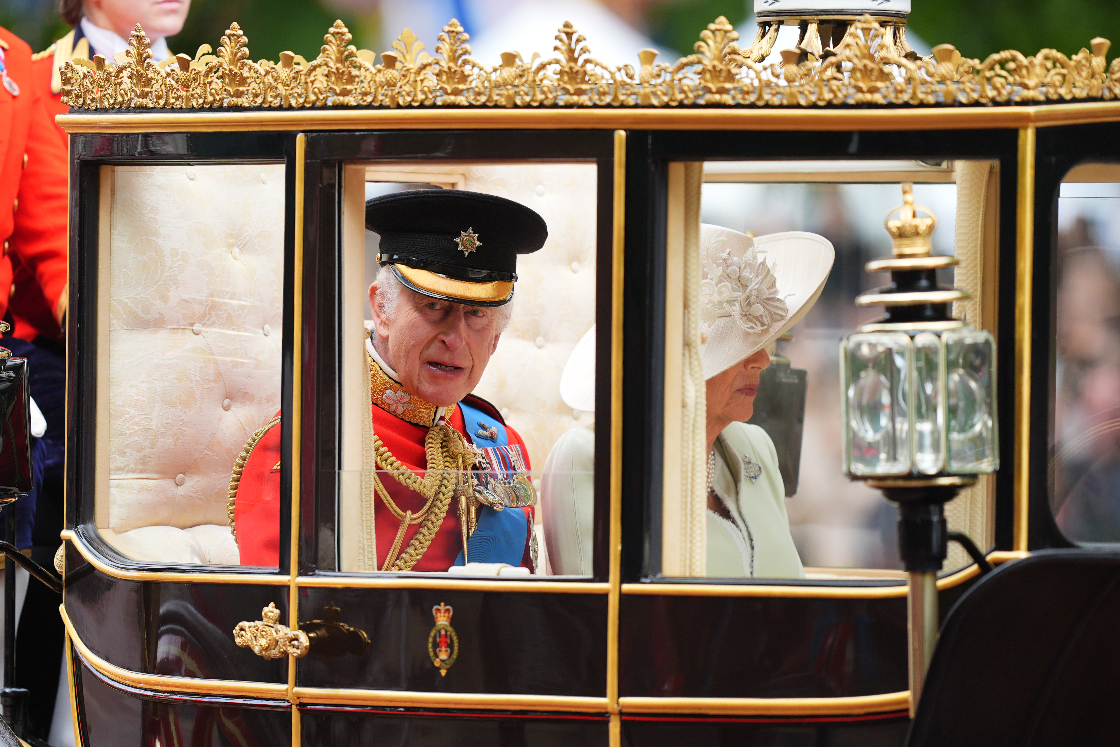 King Charles III and Queen Camilla travel along The Mall to the Trooping the Colour ceremony at Horse Guards Parade, central London, to celebrate King Charles III official birthday. Picture date: Saturday June 15, 2024.