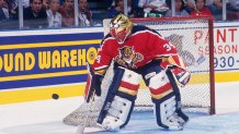 1993: Florida Panthers' goalie John Vanbiesbrouck #34 eyes the puck and makes a save during a game. (Photo by Focus on Sport via Getty Images)