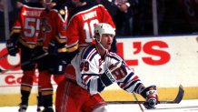 1997 Season: Wayne Gretzky pumps his fist after scoring one of his three goals against the panthers in game 4, and Player Wayne Gretzky.  (Photo by Bruce Bennett Studios via Getty Images Studios/Getty Images)