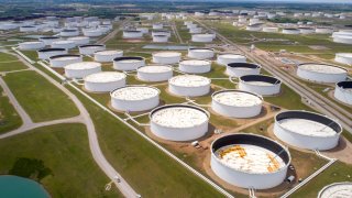 Crude oil storage tanks are seen in an aerial photograph at the Cushing oil hub in Cushing, Oklahoma, U.S., April 21, 2020.