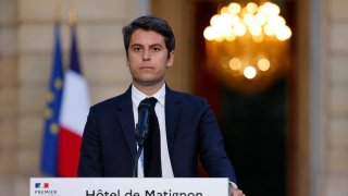 France’s Prime Minister Gabriel Attal gives a speech following the first results of the second round of France’s legislative election at Matignon in Paris on July 7, 2024. 