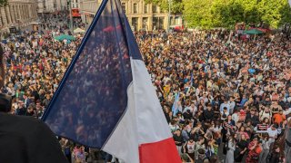 People gather to celebrate the victory of the left-wing union after the partial results of the second round of the French parliamentary elections in Paris, France on July 07, 2024.