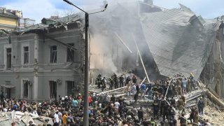 Emergency forces and civilians conduct search-and-rescue operations among the rubble of ‘Okhmatdyt’ Children’s Hospital in Kyiv, Ukraine, on July 8, 2024.