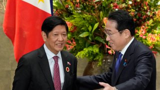 Japan’s Prime Minister Fumio Kishida (R) greets Philippines’ President Ferdinand Marcos Jr. during their bilateral meeting, on the sidelines of the ASEAN-Japan Summit, at the prime minister’s official residence in Tokyo on December 17, 2023.