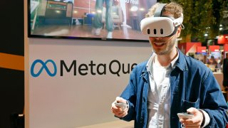 A visitor wears a virtual reality headset Meta Quest as he takes part in an immersive experience stand during the Viva Technology show at Parc des Expositions Porte de Versailles on May 24, 2024 in Paris, France.