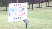 Yard sign reading “F*** Em' Both 2024” infront of a home in Lakeland, Tenn.