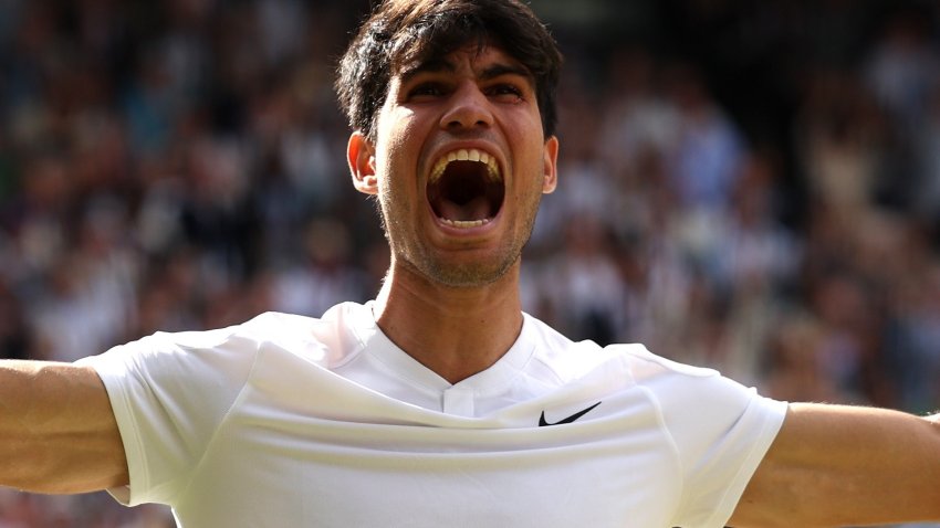 Carlos Alcaraz screams after winning Wimbledon