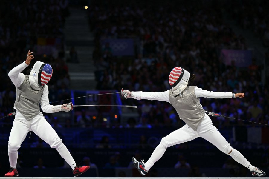 US' Lauren Scruggs (left) and US' Lee Kiefer (right) compete in the women's foil individual gold medal