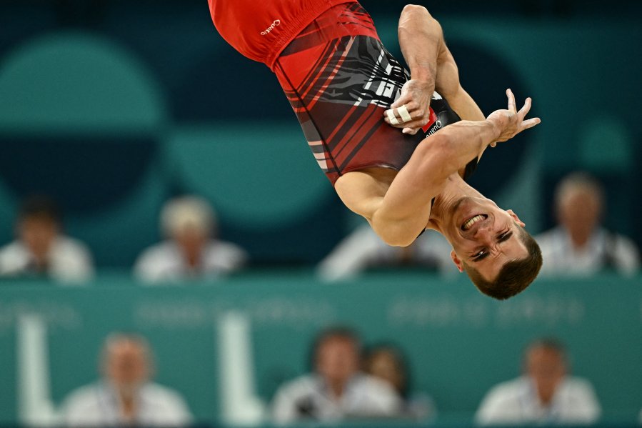 Switzerland's Florian Langenegger competes in the floor event of the artistic gymnastics men's team final during the Paris 2024 Olympic Games at the Bercy Arena in Paris.