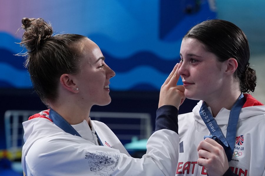 Andrea Spendolini-Sirieix  and Lois Toulson (L) of Great Britain celebrate the bronze medal after competing Women's Synchronized 10M Platform Final on day five of the Olympic Games Paris 2024 at Aquatics Centre in Paris, France on July 31, 2024