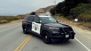 A CHP cruiser halts traffic on Highway 1 near Devils Slide. (July 26, 2024)