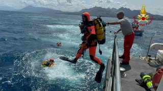 Divers operate in the sea to search for the missing, including British entrepreneur Mike Lynch, after a luxury yacht sank off Sicily, Italy August 19, 2024. 