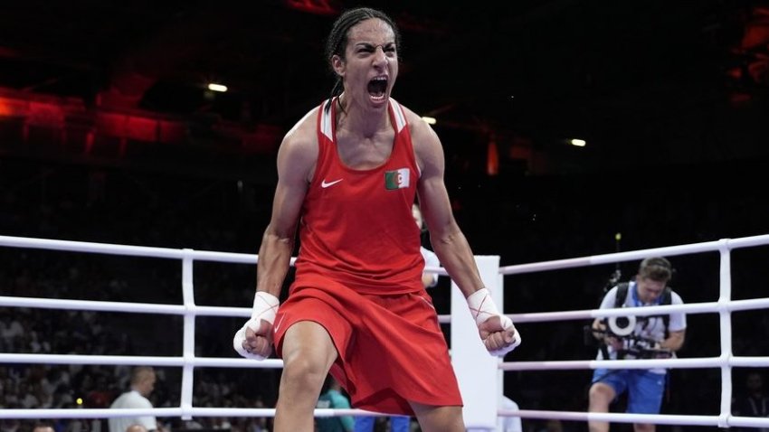 Algeria’s Imane Khelif, celebrates after defeating Hungary’s Anna Hamori in their women’s 66kg quarterfinal boxing match at the 2024 Summer Olympics, Saturday, Aug. 3, 2024, in Paris, France. (AP Photo/John Locher)