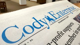 A recent issue of the Cody Enterprise, the Wyoming newspaper where a reporter used artificial intelligence to help write his stories, is seen Tuesday, Aug. 13, 2024, at the Wyoming State Library in Cheyenne.